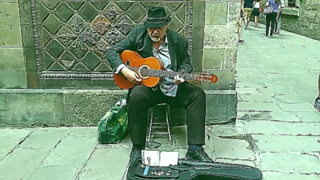 Уличный музыкант в Барселоне 