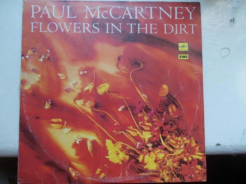 Paul McCartney  Flowers In The Dirt LabelMPL  064 7 91653 1 FormatVinyl, LP, Album, Stereo CountryEurope Released1989 GenreRock StyleFolk Rock, Soft Rock, Pop Rock - B1 Figure Of Eight Producer  Steve Lipson*, Trevor Horn 323 B2 This One 410 B3 Don't Be Careless Love Producer  Elvis Costello, Mitchell Froom 317 B4 That Day Is Done Producer  Elvis Costello, Mitchell Froom, Neil Dorfsman 418 B5 How Many Peopl